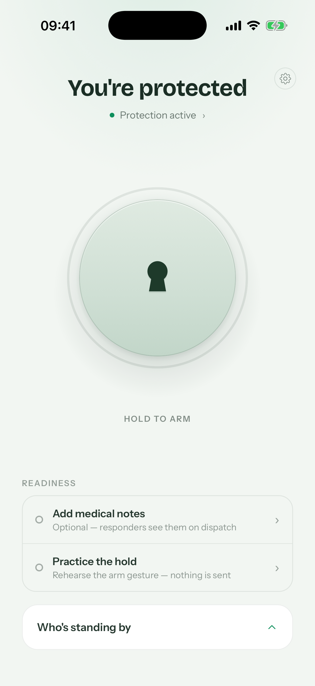 The ELA home screen: the words You're protected, protection active, a large keyhole dial marked hold to arm, and a readiness list